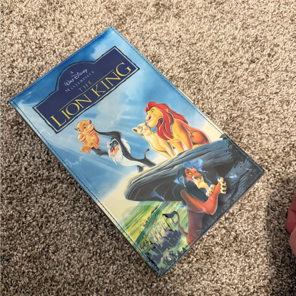 EUC Oh My Disney Lion King VHS Clutch